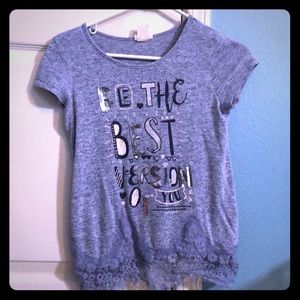 Blue shirt lace on bottom with quote